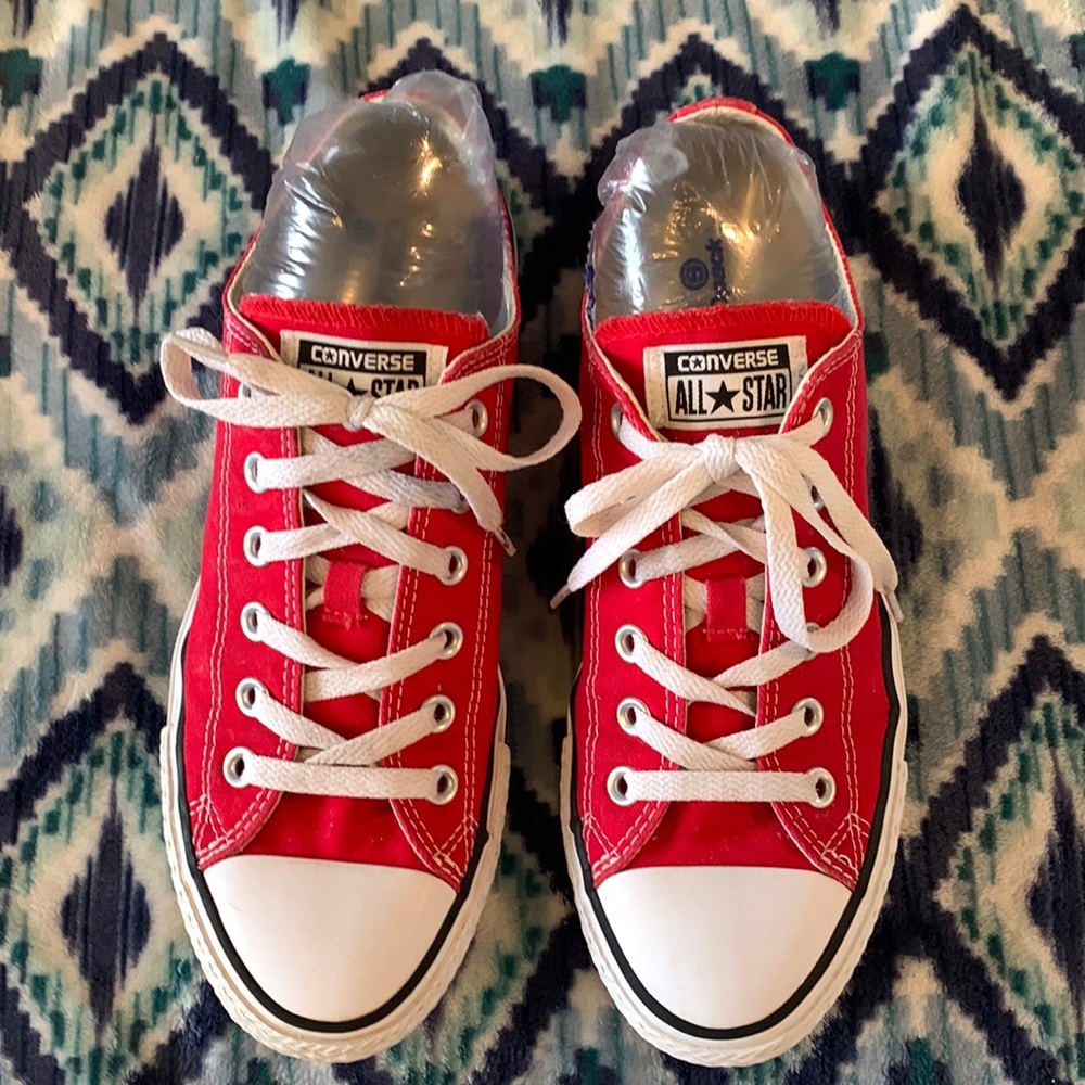 Red Converse low top shoes